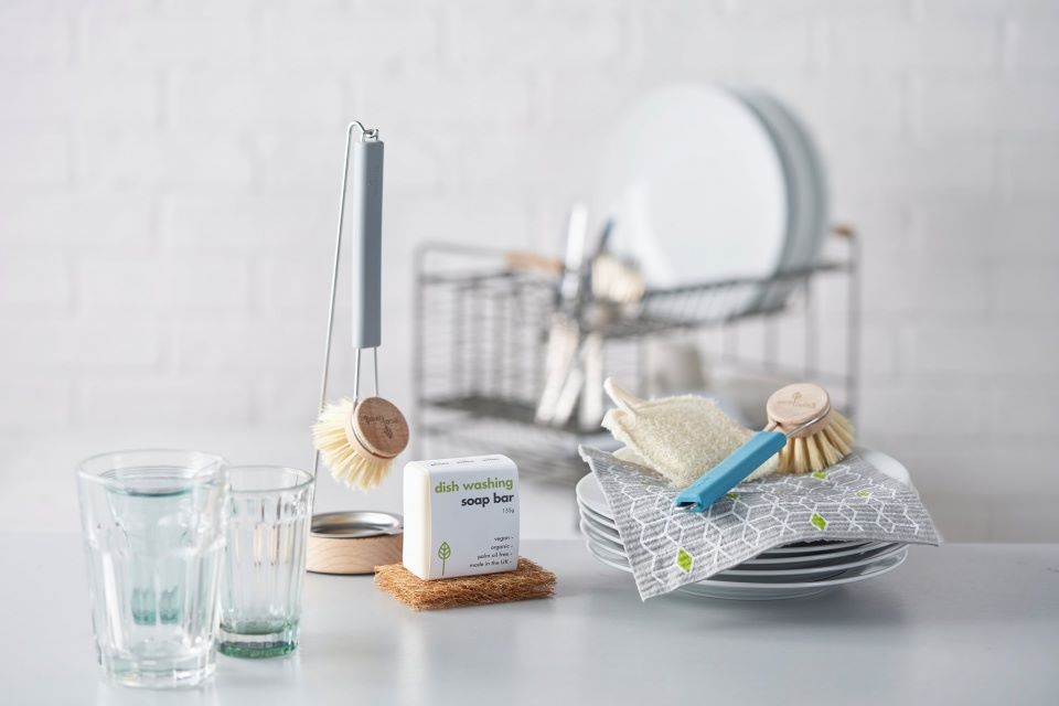 Ecoliving plastic free dish brushes with glasses and crockery 