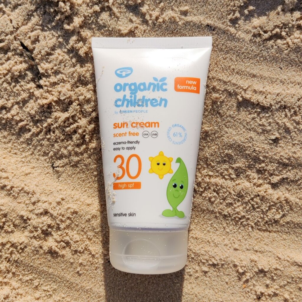 Green People Organic Children suncream on the sand