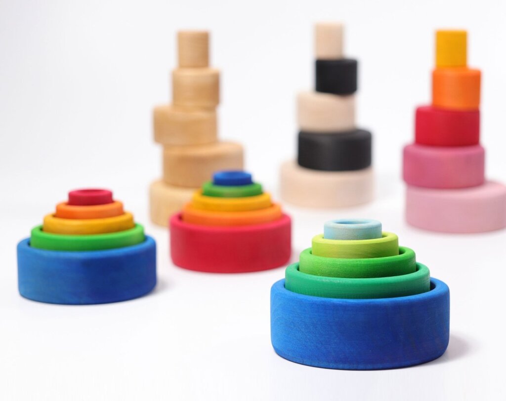 Grimm's Wooden Stacking Bowls in a variety of colours make a great gift for a 12 month old baby