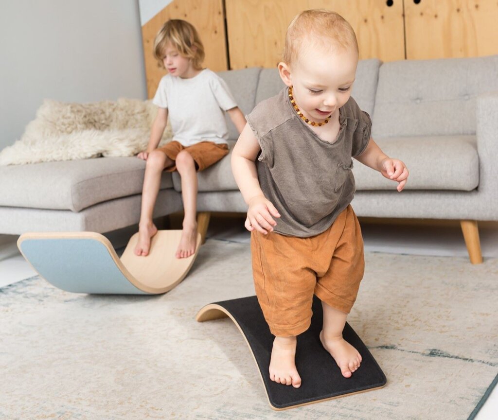 Starter Wobbel Board, a rocker board for babies, makes a great big ticket gift for 6-12 months