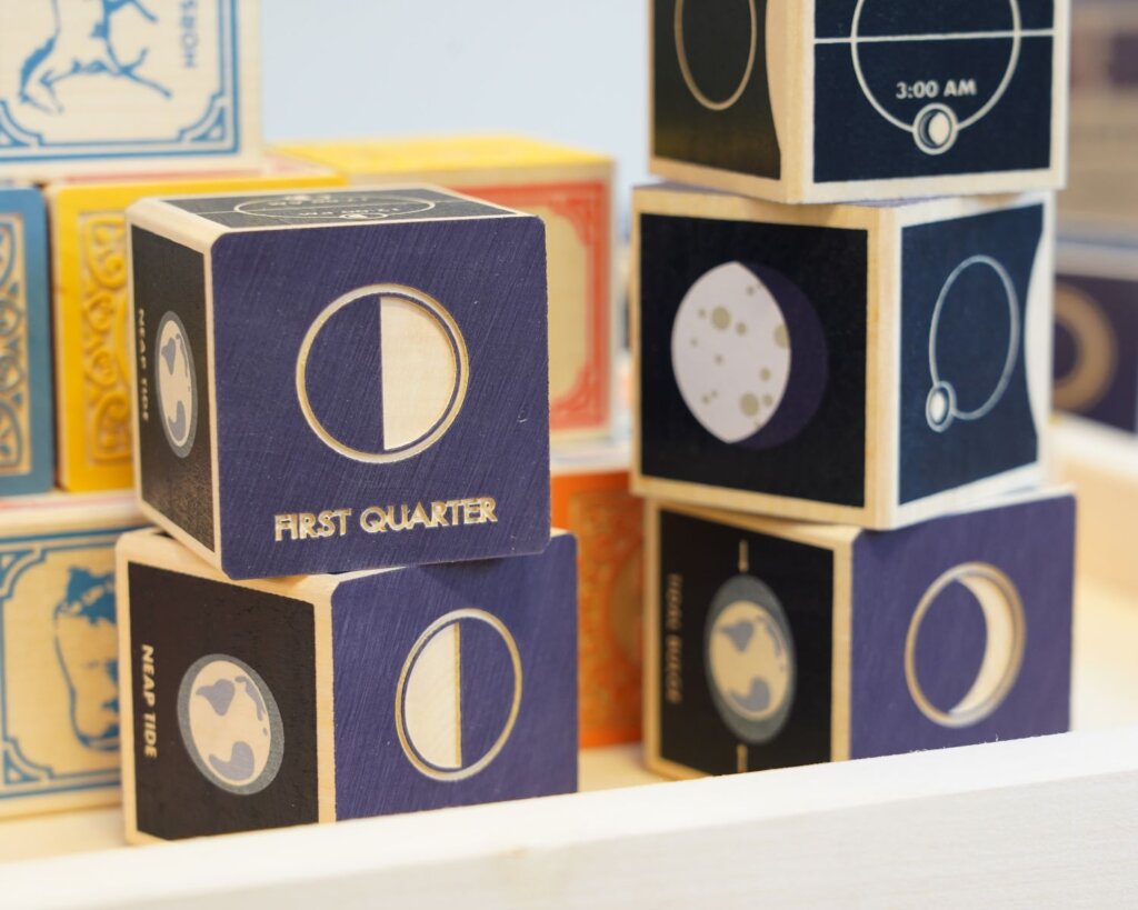 Uncle Goose Moon Phase Blocks stacked up on a shelf