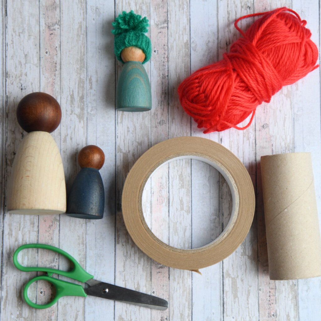 What materials needed to make your own peg doll hat, including paper tape, scissors, cardboard and wool