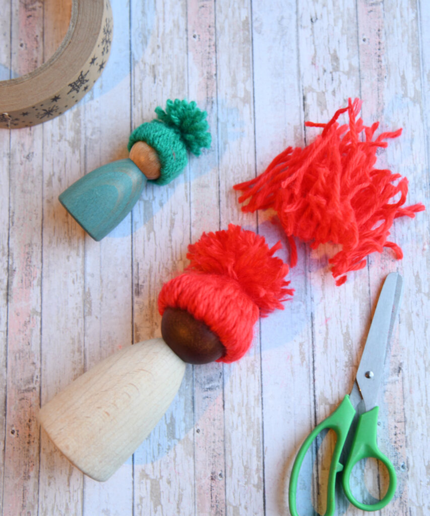 Tie the loose ends together, and trim the top to create a cute pompom.